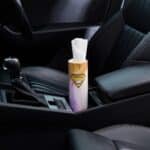 Master Roll bamboo car tissues 12 pack placed in a car cup holder