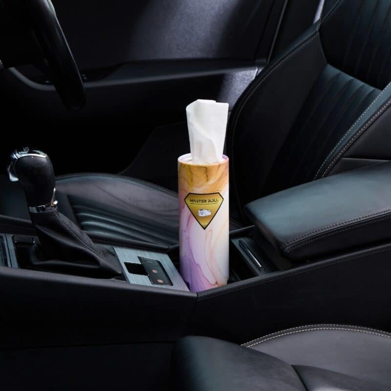 Master Roll bamboo car tissues 12 pack placed in a car cup holder